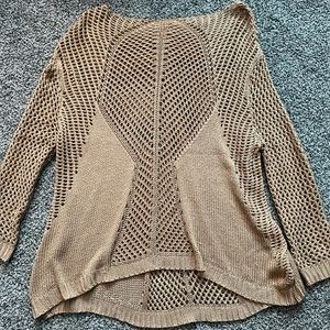 Long brown knitted sweater